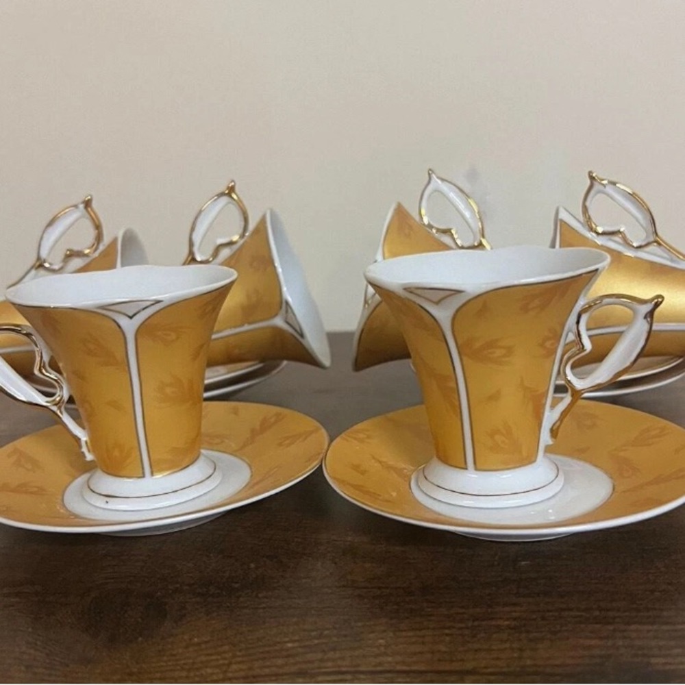 Elegant Gold and White Tea Cup Set